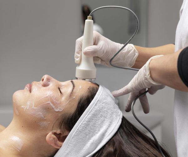 young-woman-having-facial-treatment
